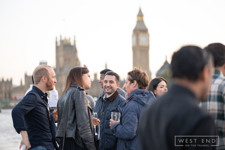 Corporate group networking with big ben backdrop