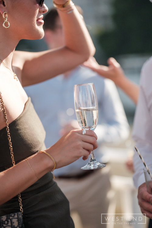 Welcoming drinks on board, featuring seasonal favorites that set a relaxed, celebratory tone for the 2026 summer theme.